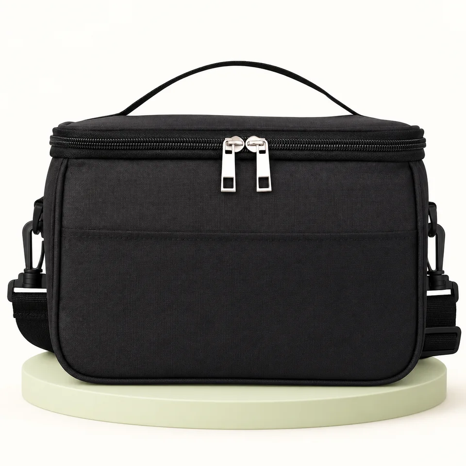 BALIGO — sac repas noir à poignée et sangle — Un sac noir fermé ; emblème retiré, aucune variante supplémentaire.